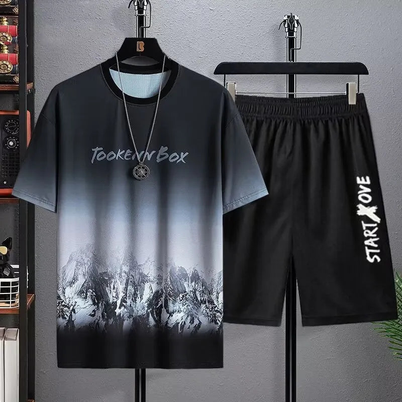 Men's light grey summer tracksuit consisting of a short sleeve t-shirt and matching shorts on a hanger.