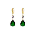 Green geometric teardrop alloy earrings with drop design on display