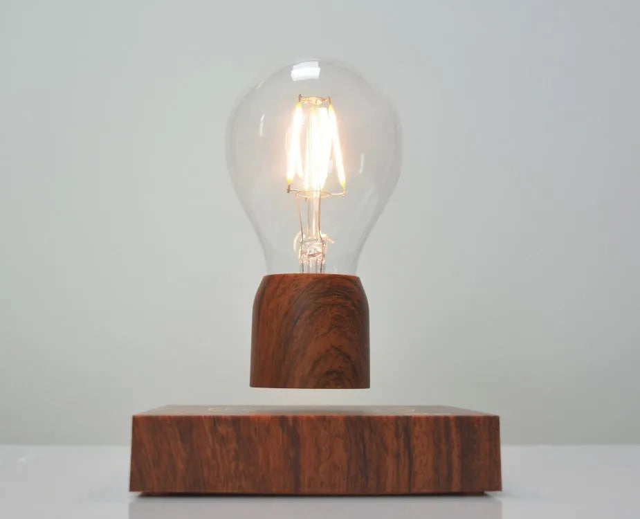 Magnetic levitation floating bulb on imitation wood base with glass enclosure and ABS construction