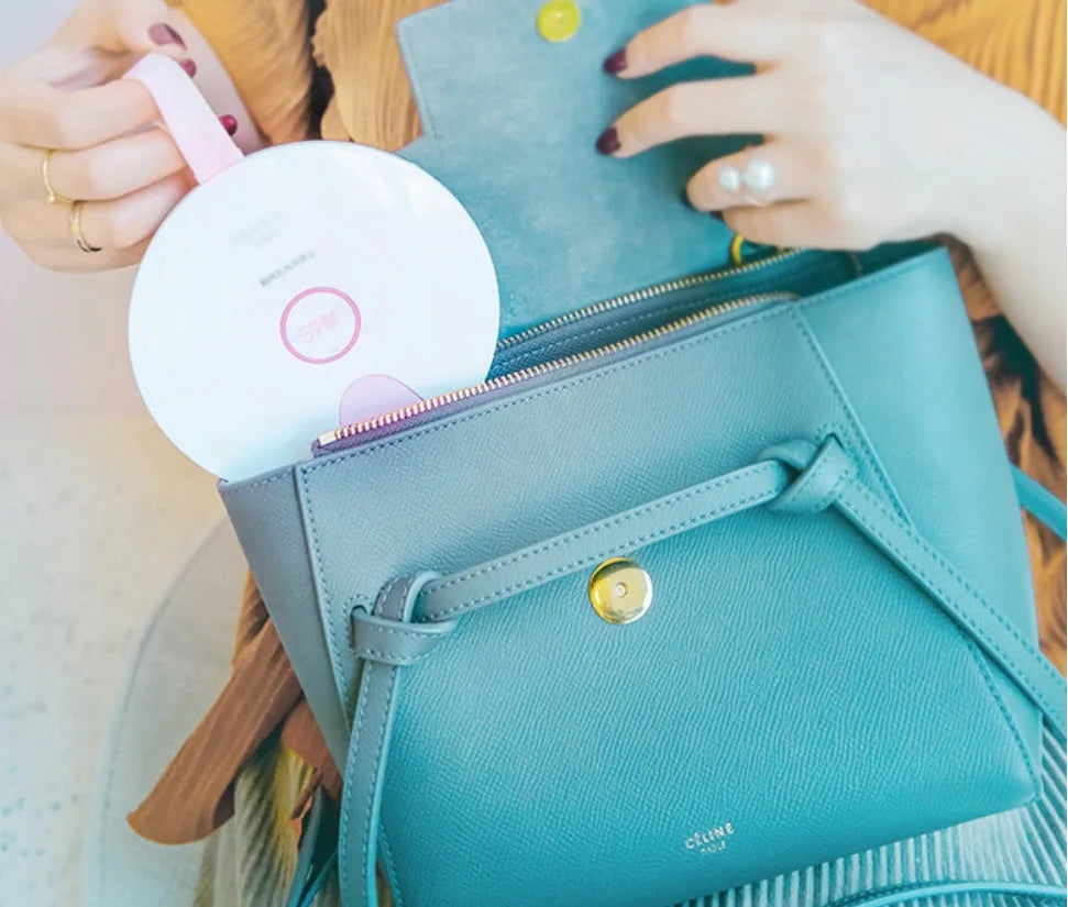 Portable UV baby bottle steriliser in blue colour showing compact design with USB charging port