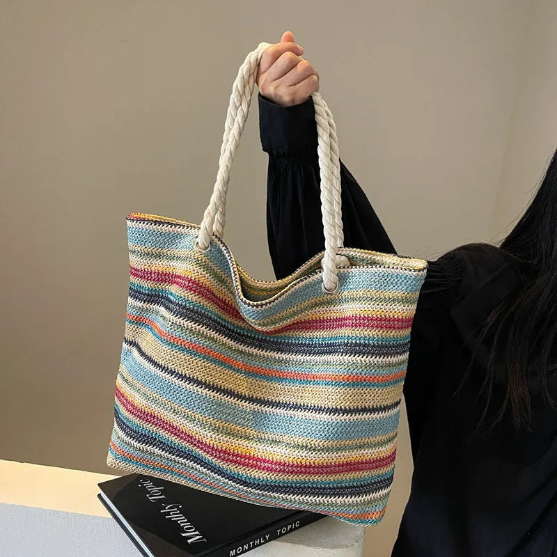 Blue straw woven shoulder bag with nylon construction and polyester lining