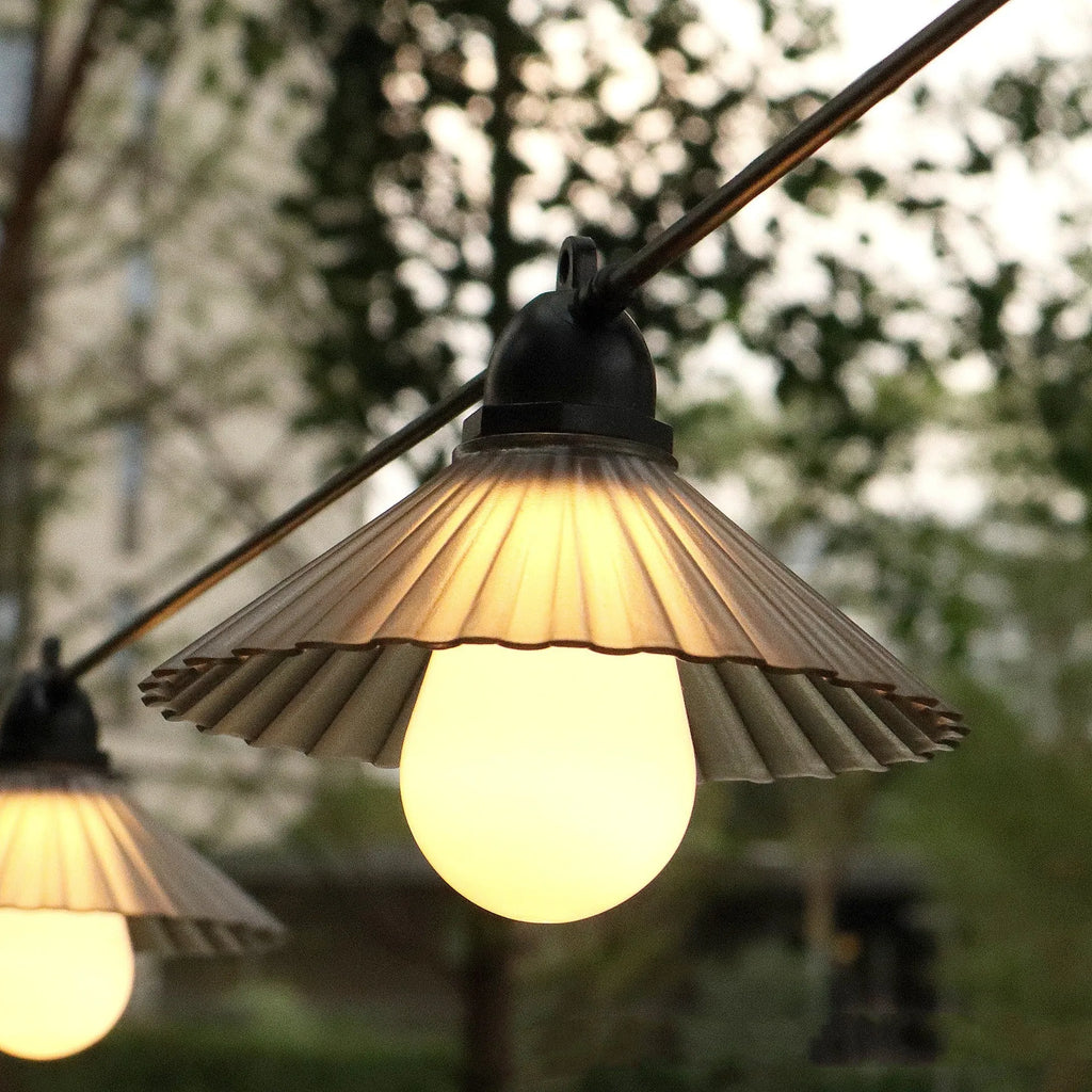 Outdoor LED string lights with flower-shaped globe bulbs in warm white or multicolour options