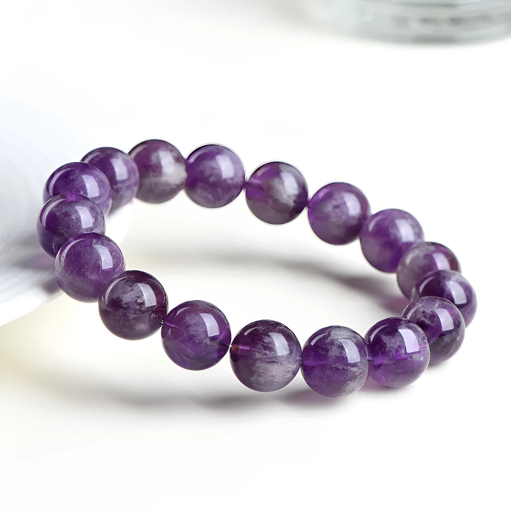 Natural snow mountain purple feather amethyst crystal bracelet with scattered geometry beads and Ruyi design