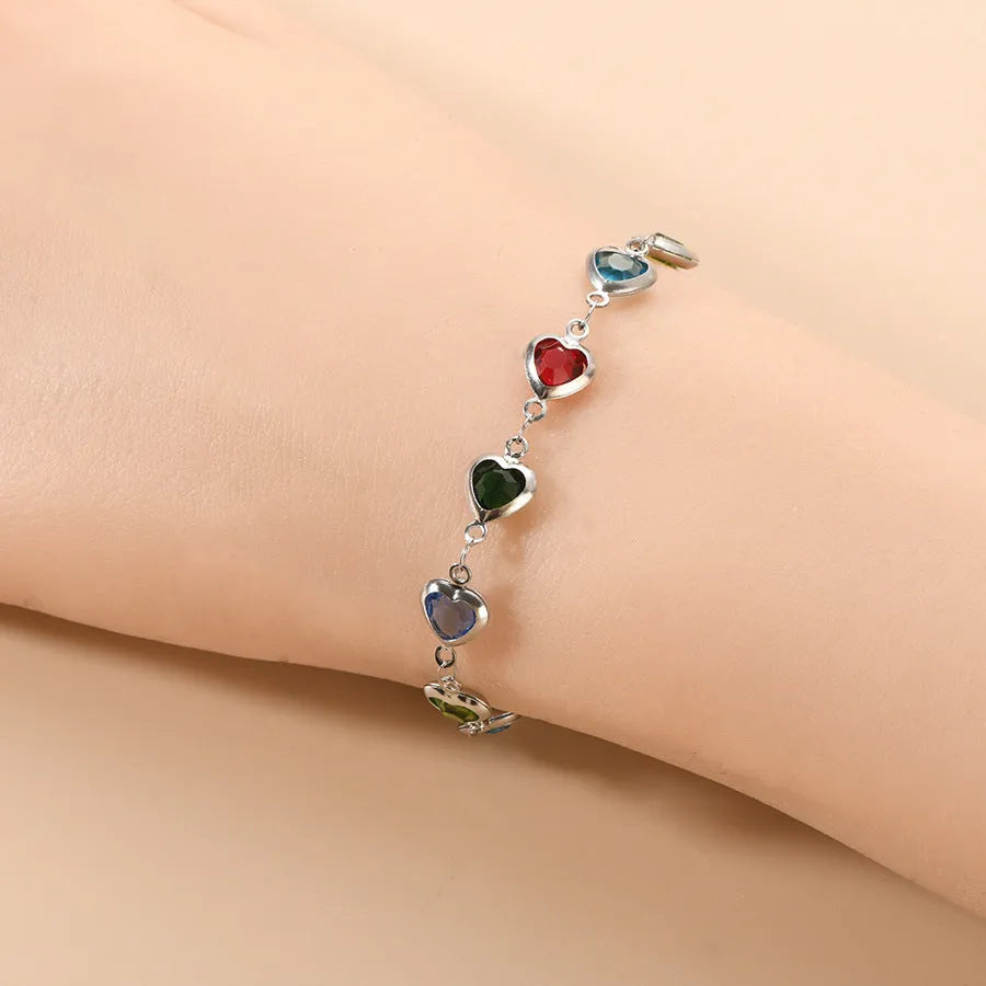 A stainless steel geometric heart bracelet with a Devil's Eye design in one of six electroplated colour options.