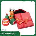 Christmas vinyl dog chew toys gift sets with festive designs including trees, Santa heads, and bite ropes
