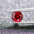 Cultured ruby gemstone in pigeon blood red colour showing different carat sizes and cut styles