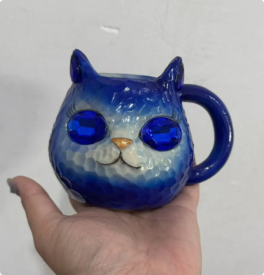Resin crystal earth cat cup craft ornament in blue, green, pink or purple for promotional gifting.