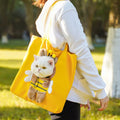Canvas pet carrier backpack showing cartoon patterns for small dog and cat transport