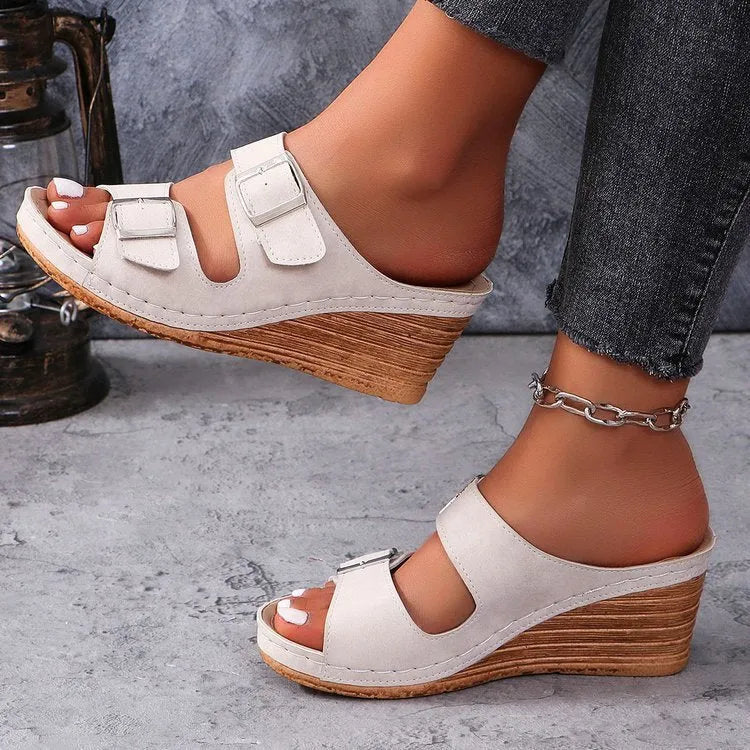Women's creamy-white wedge beach slippers with decorative buckle detail on PU upper