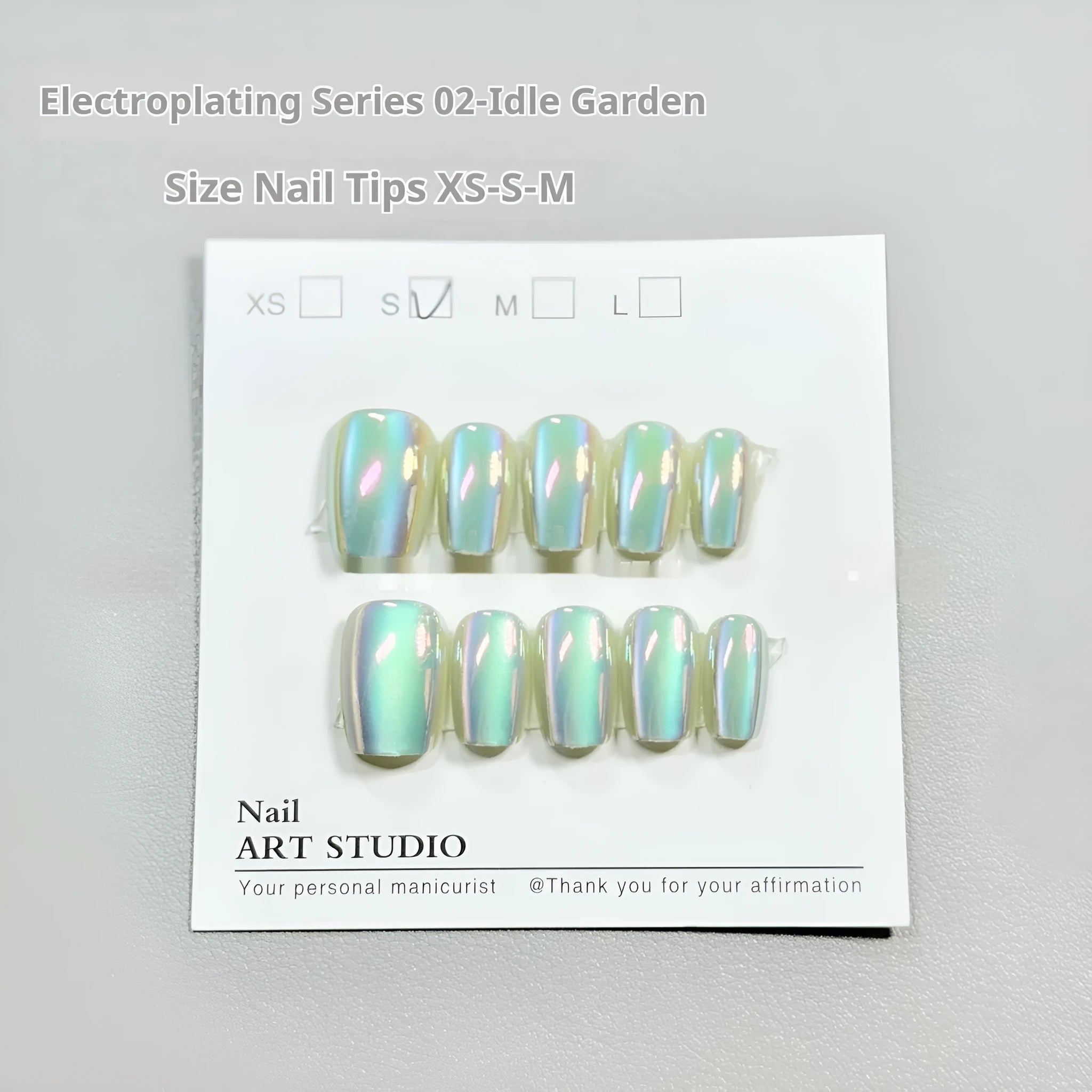 Electroplating Cat's Eye 02 Idle Court artificial nail set showing Aurora, solid colour, and Cat's Eye designs in short ladder sizes.