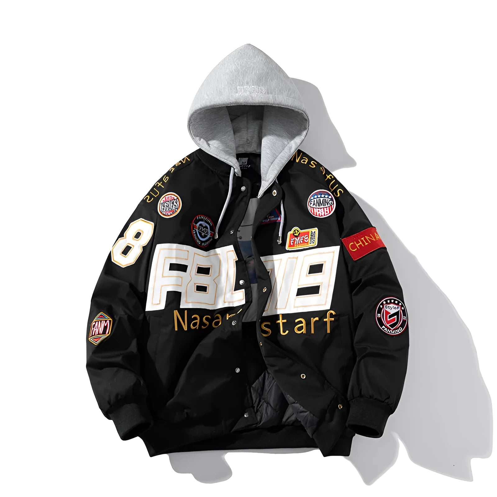 Man wearing a black motorcycle-style baseball jacket with a removable hood, featuring a side seam pocket.