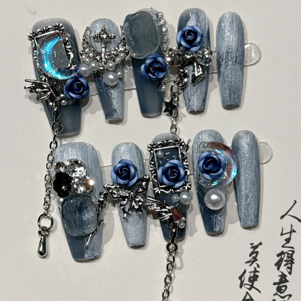 Blue nail wraps with ornate rose floral pattern in XS, S, M, and L sizes