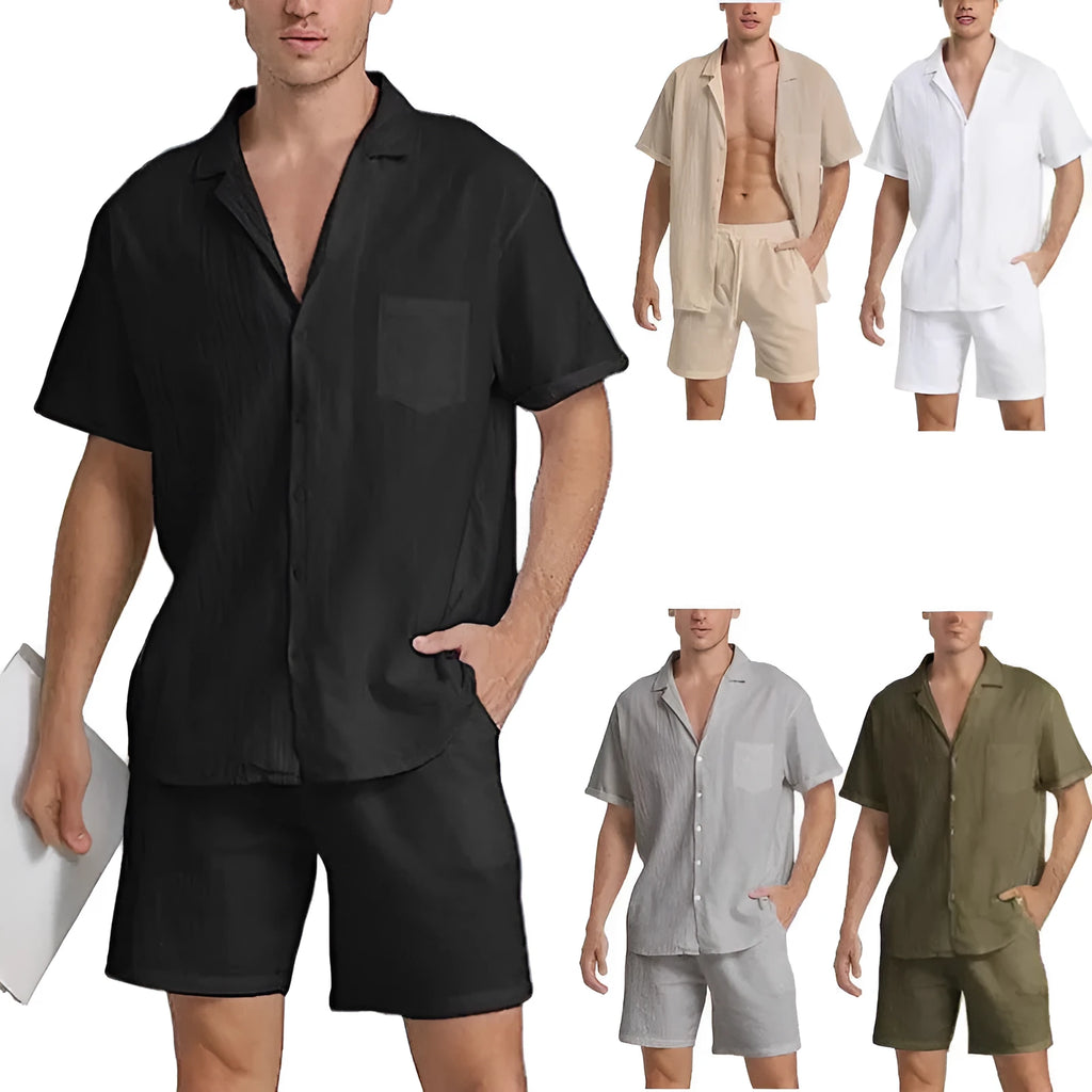Man wearing a light grey short-sleeved Flax top and matching shorts from a summer sports suit set.