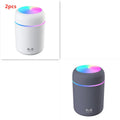 Pink USB desktop humidifier with mood lights and water tank