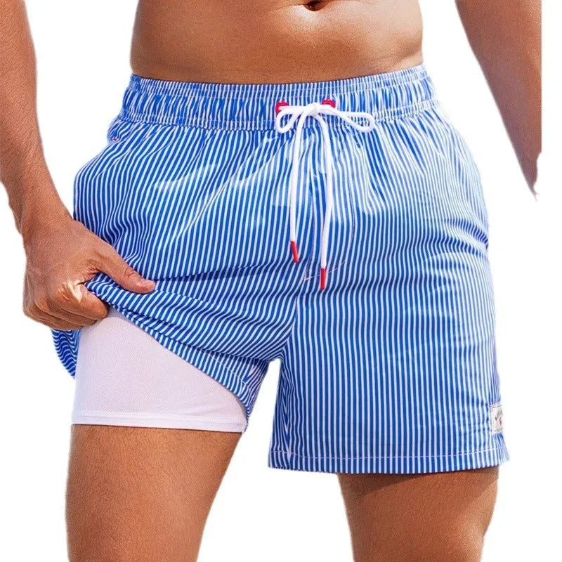 Men's loose quick-drying swimming trunks in floral pattern with boxer-style cut