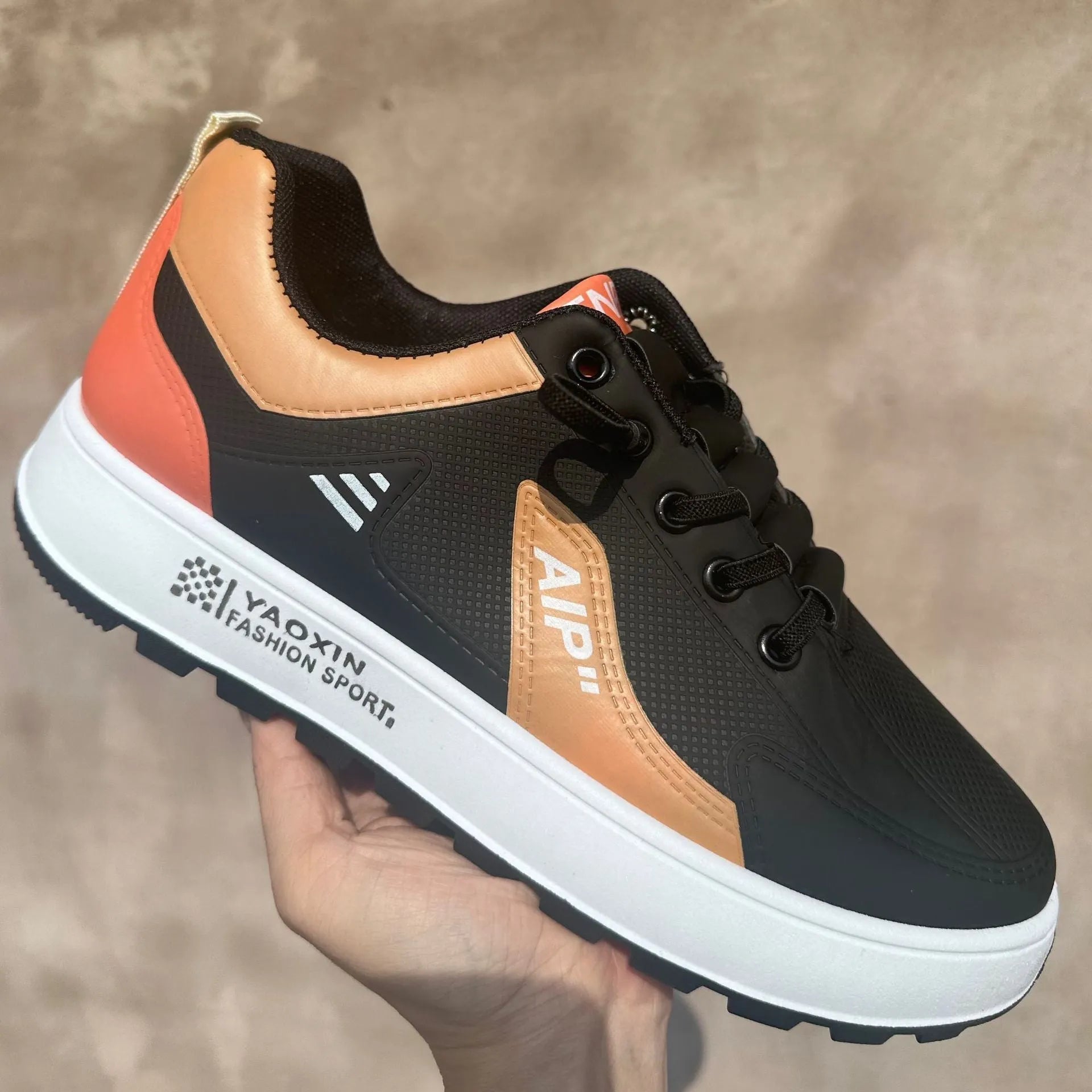 Men's white casual shoes with black trim and round toe design on artificial PU upper