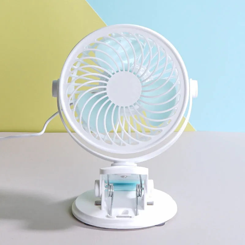 Mini USB desk fan in clip and floor standing styles on a wooden desk