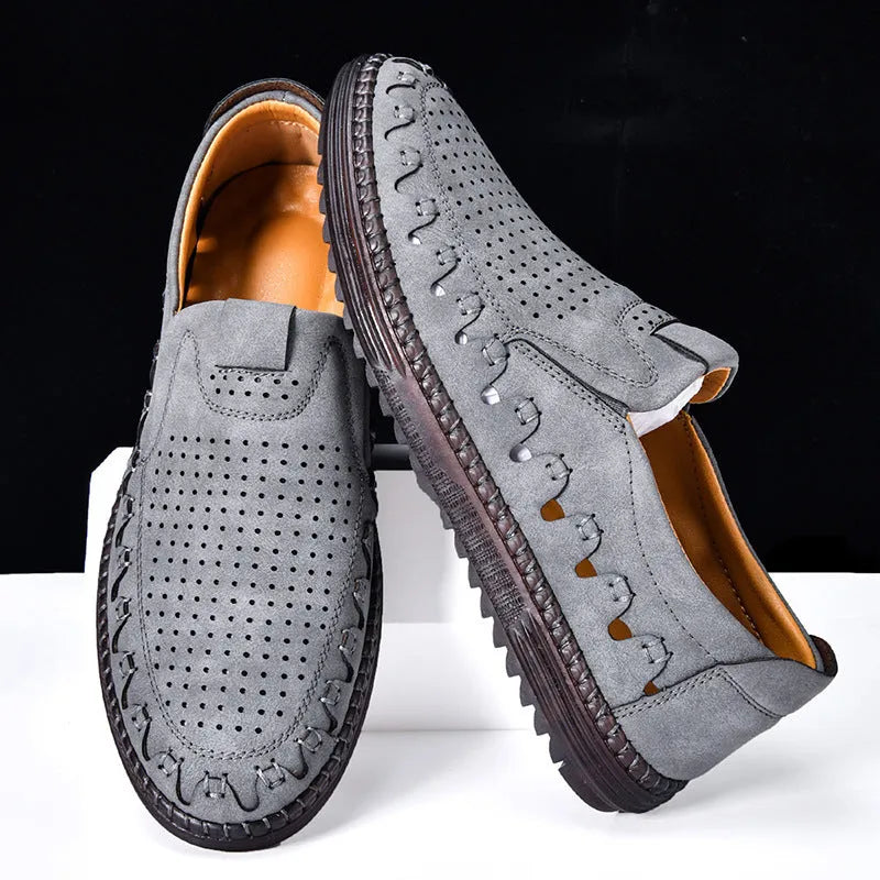 Men's brown slip-on casual shoes with round toe and flat PVC sole showing sewing line detailing