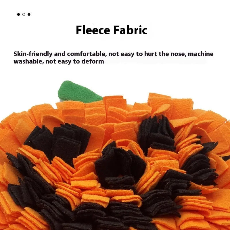 Orange pumpkin-shaped pet smell mat with textured pockets for dog training and slow feeding.
