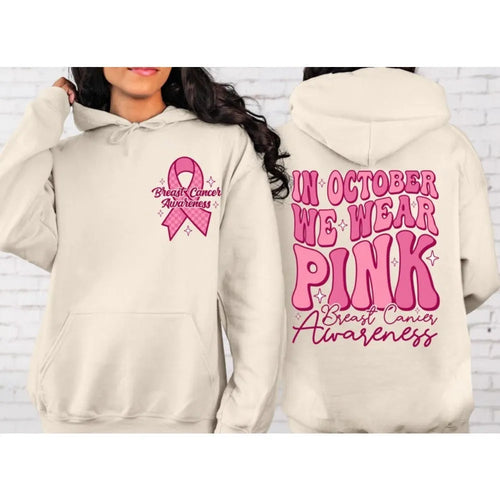 Pink Breast Cancer Awareness pullover hoodie with retro art print and side seam pocket.