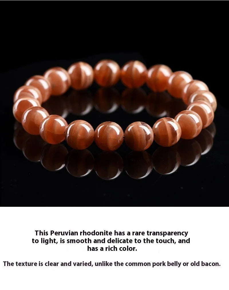 Peruvian Old Mine Rhodochrosite bracelet with geometric design and round beads