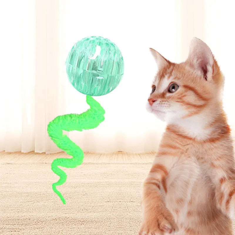 Interactive bouncy ball cat toy with soft plush worm tail in green, pink, or purple colours