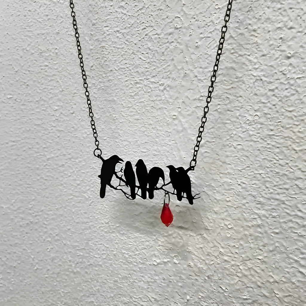 Black electroplated alloy crow necklace with cross chain closure for gothic fashion