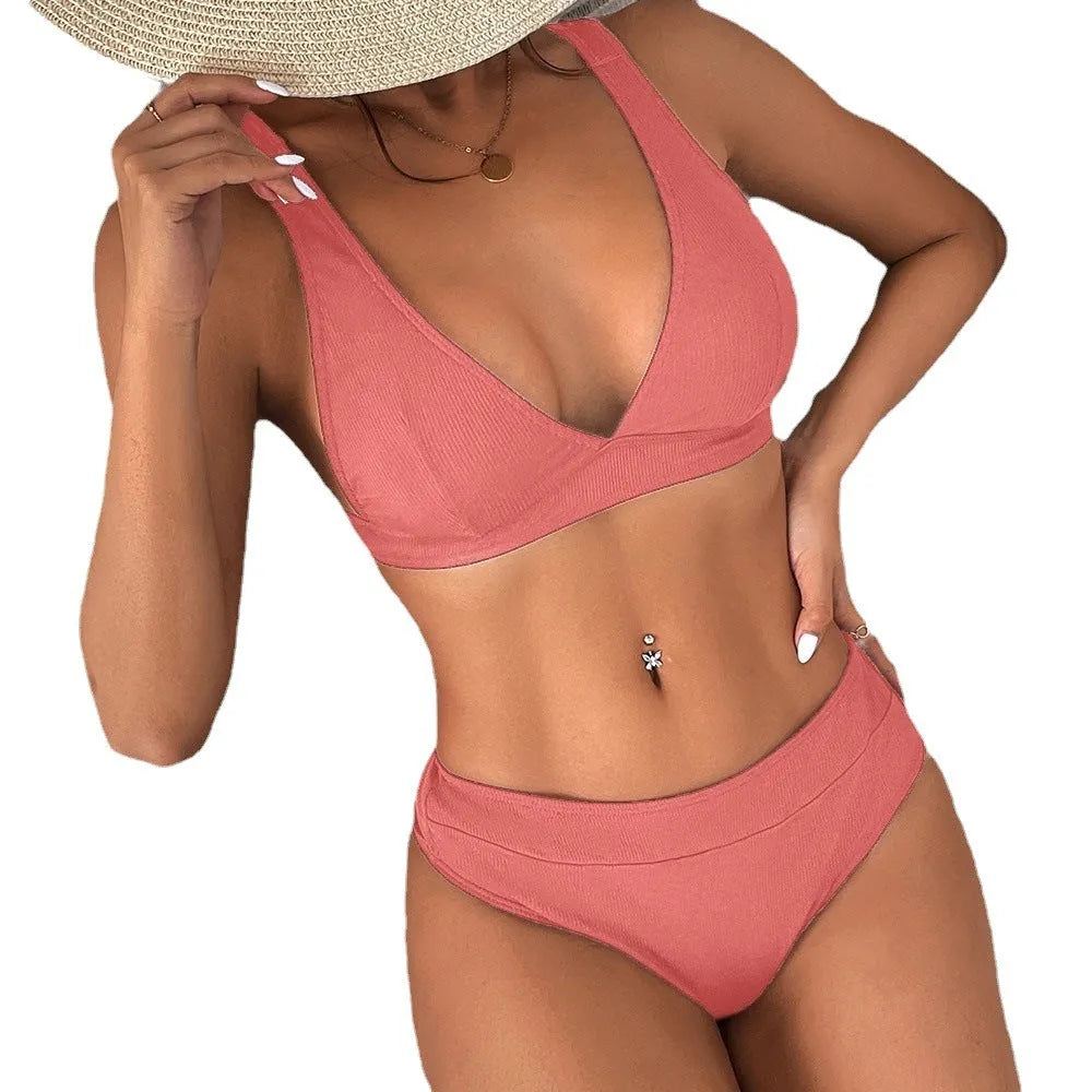 Women's black rib lace-up split bikini set with high-waist briefs on a mannequin.