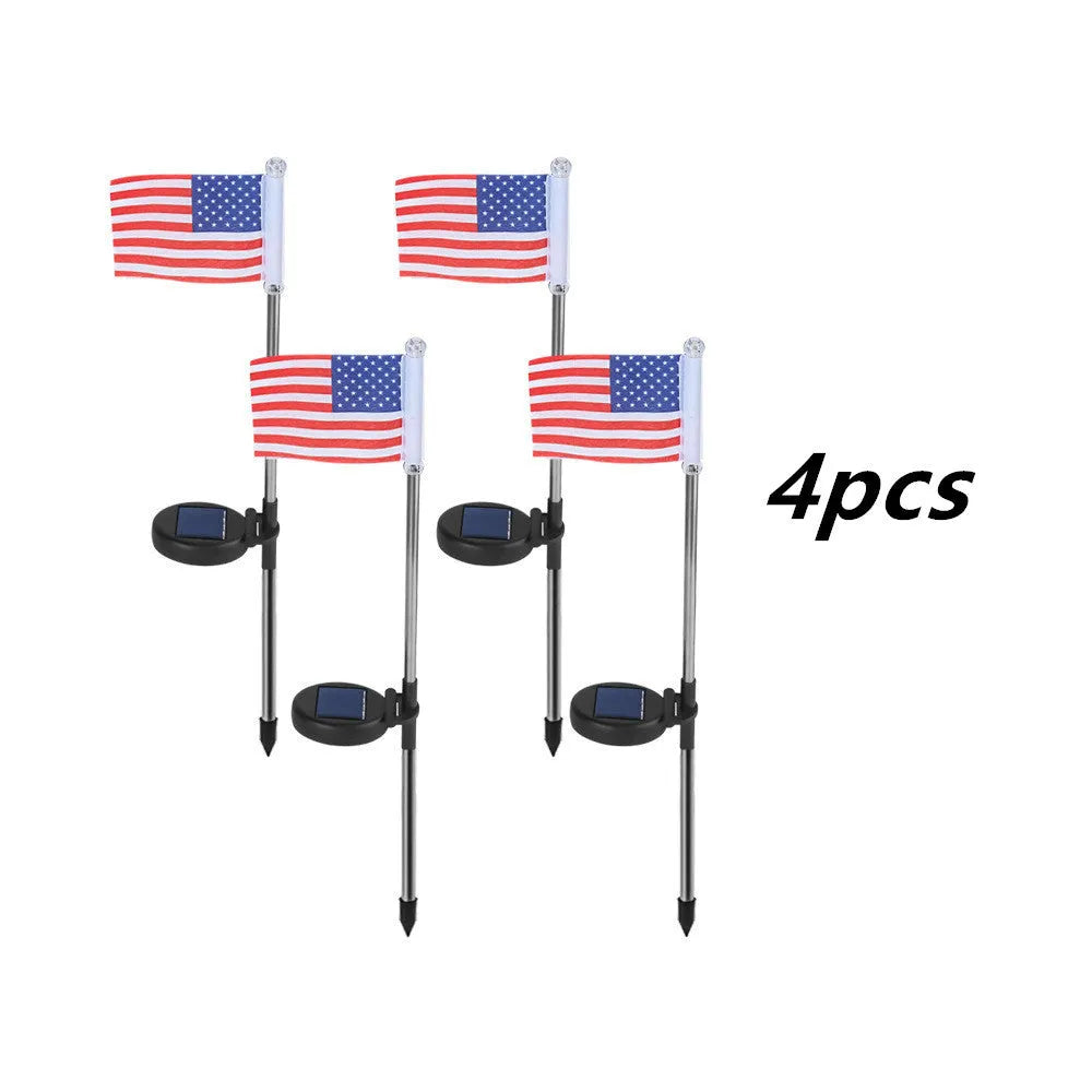 Solar-powered garden flag light with stainless steel pole displaying American or British flag design