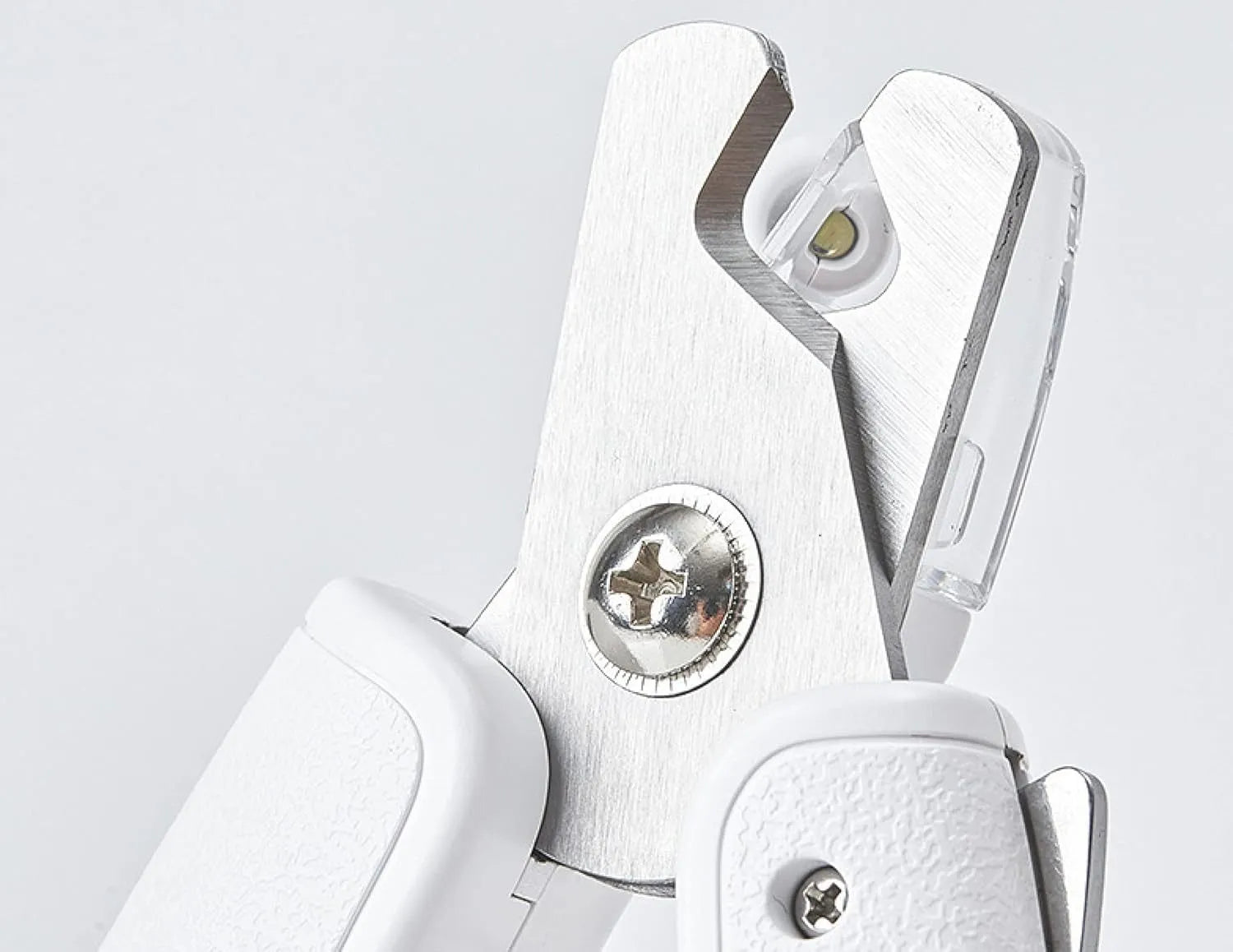 White pet nail clippers with LED light, anti-splash guard, and leather-like handle.