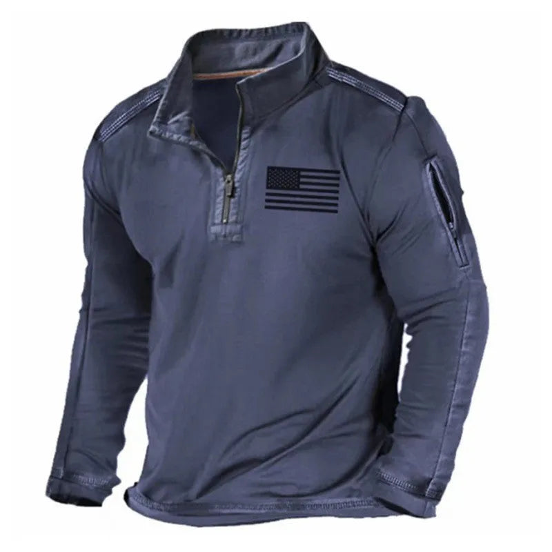 Men's dark coloured zip-up sweater with a stand collar and long sleeves laid flat.