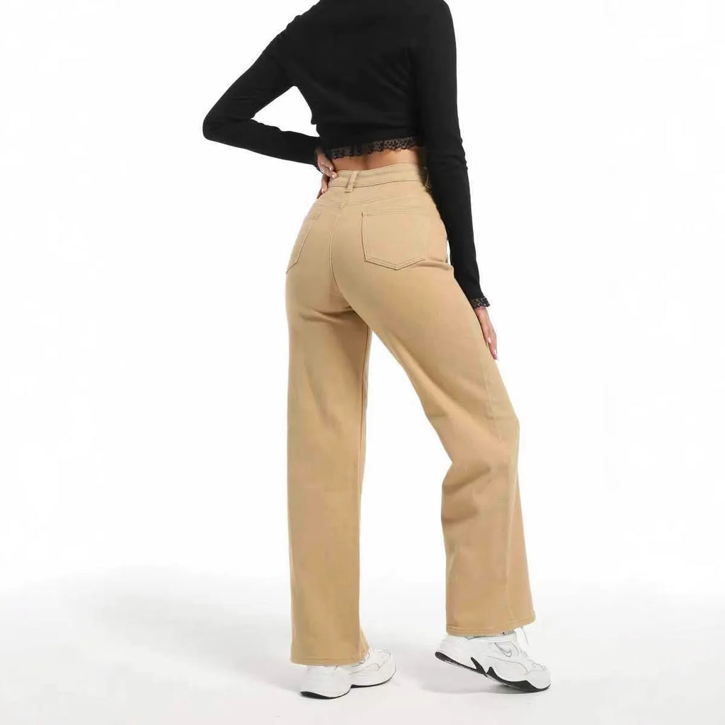 Women's high-waist wide-leg jeans in apricot and khaki colours, showing the relaxed fit and trouser length.