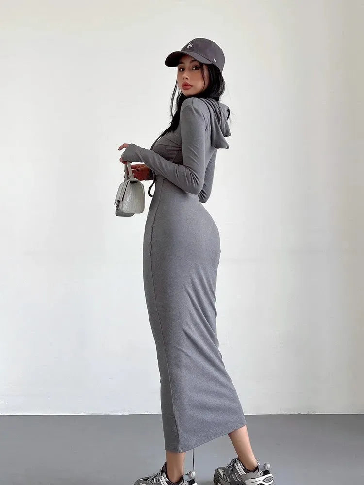 Women's long sleeve hooded sheath dress in polyester, shown in a neutral colour on a model.