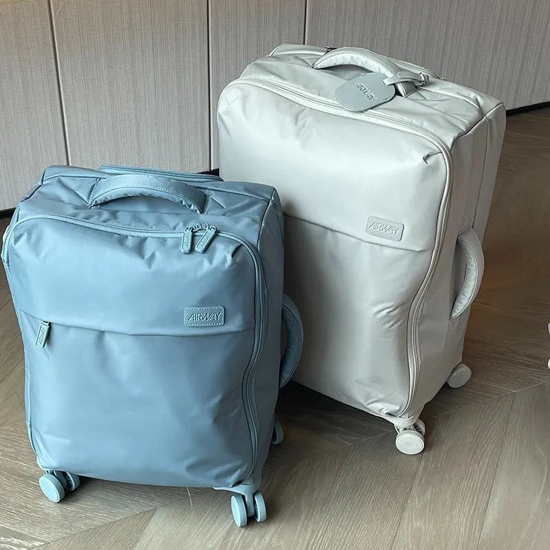 20-inch waterproof Oxford cloth suitcase in bluestone green with universal wheels
