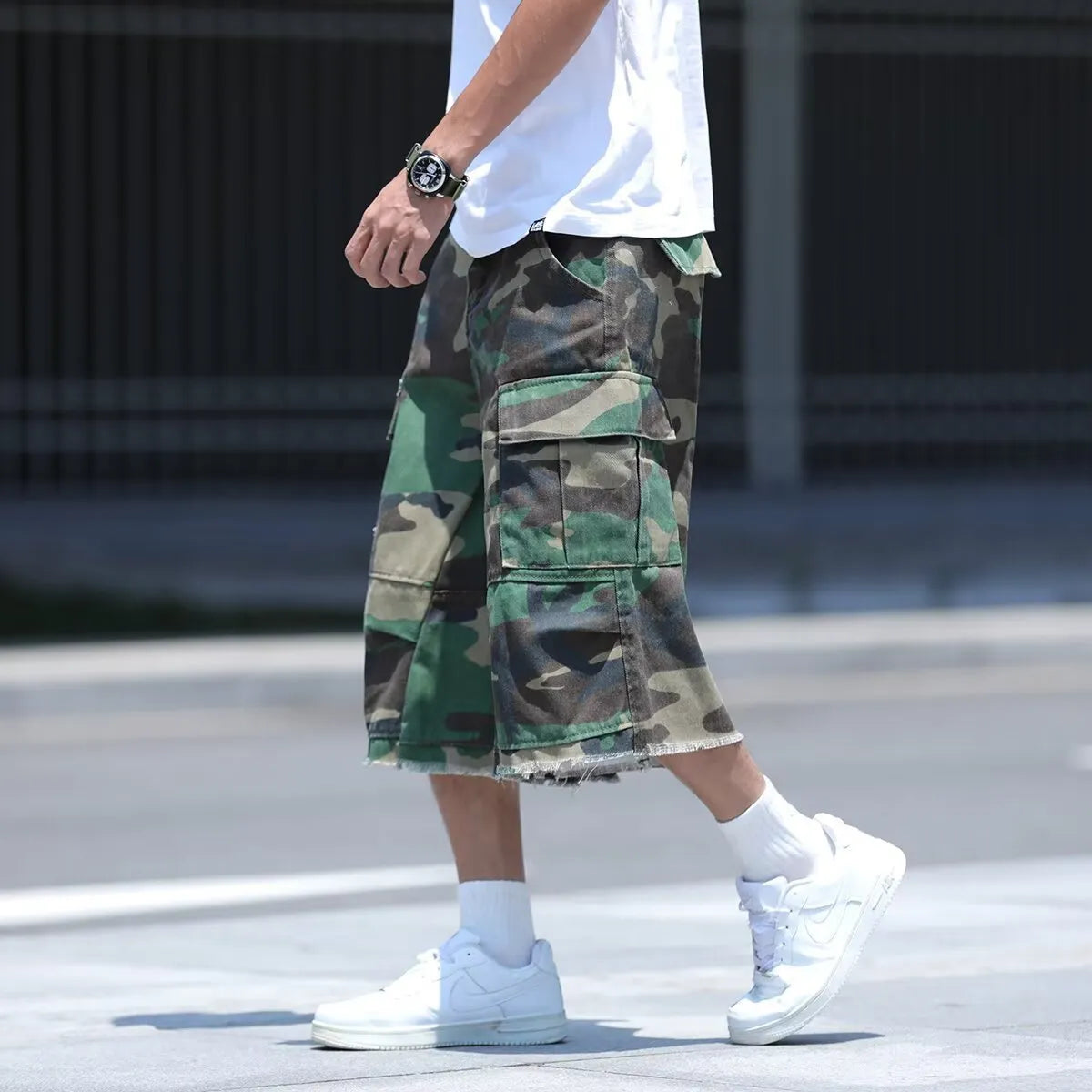 Men's loose-fitting cotton camouflage shorts in a cropped, retro workwear style