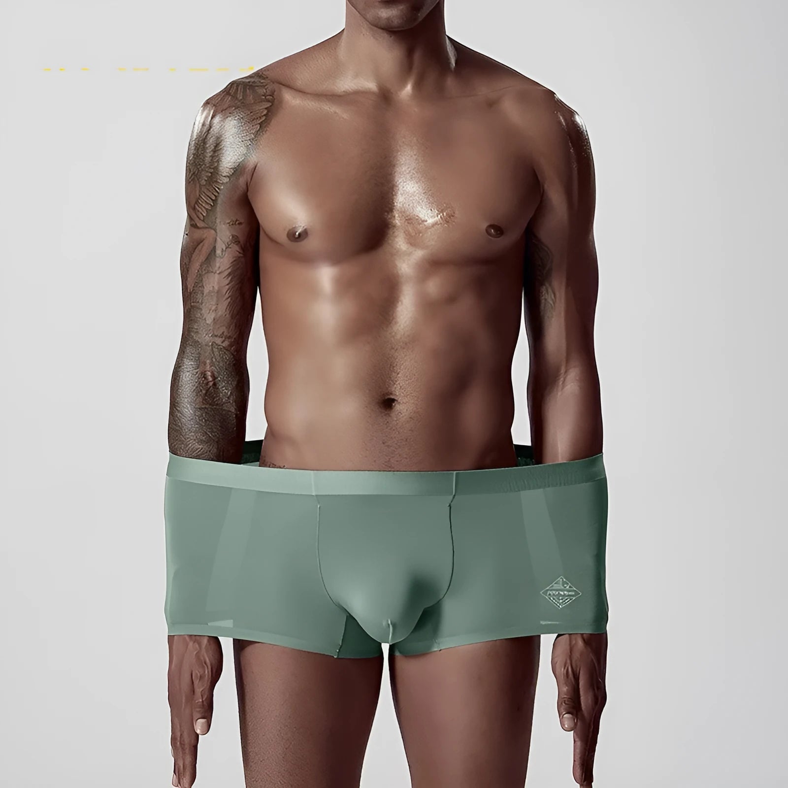 Seamless modal men's underwear in green colour showing mid-waist design