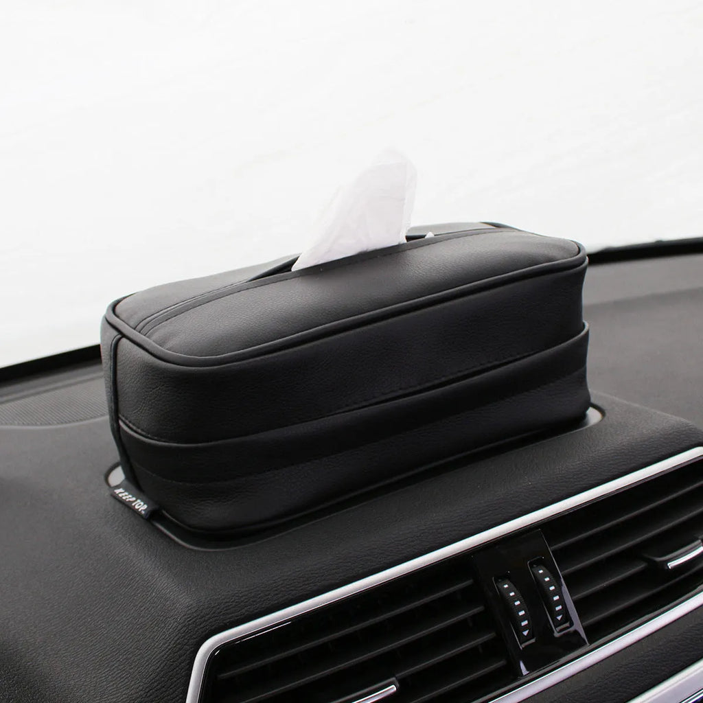 Black leather car hanging storage box with open top, shown next to a beige medium-sized version.