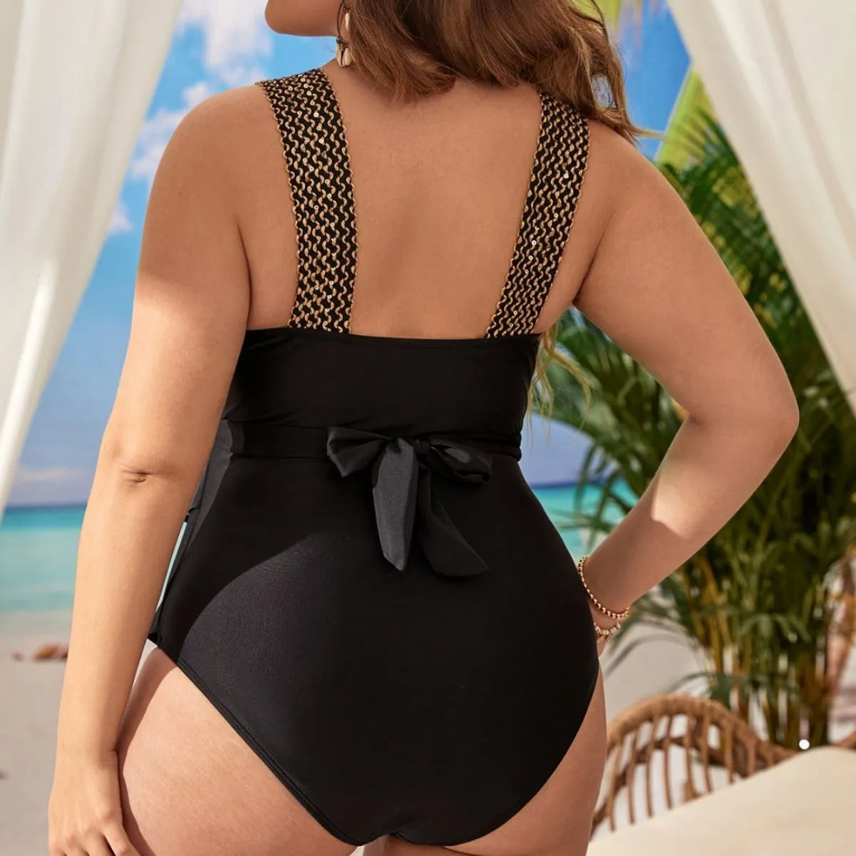 Women's plus size one-piece swimsuit with chest pad in colours black, peacock blue, dark red, dark pink, or brown.