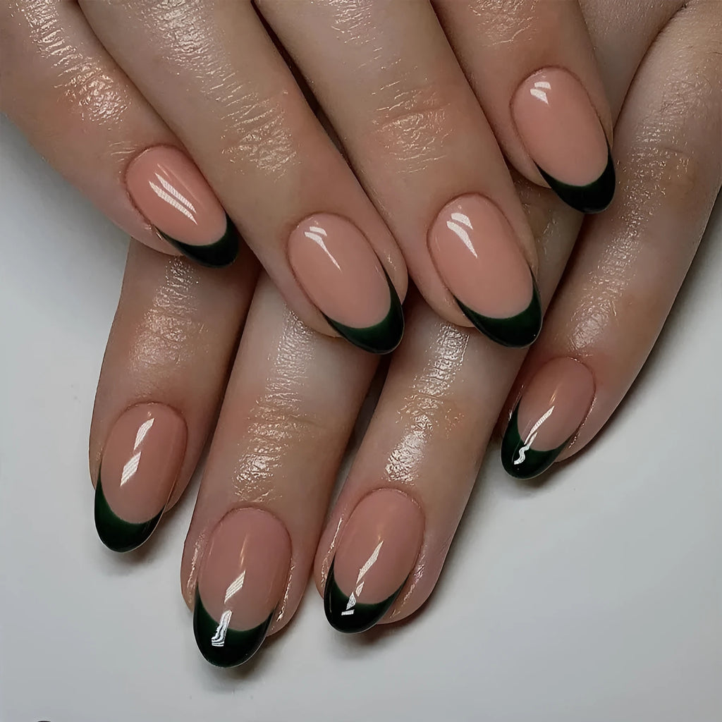 Black French tip false nails in short almond shape, 24 piece set on a white background.