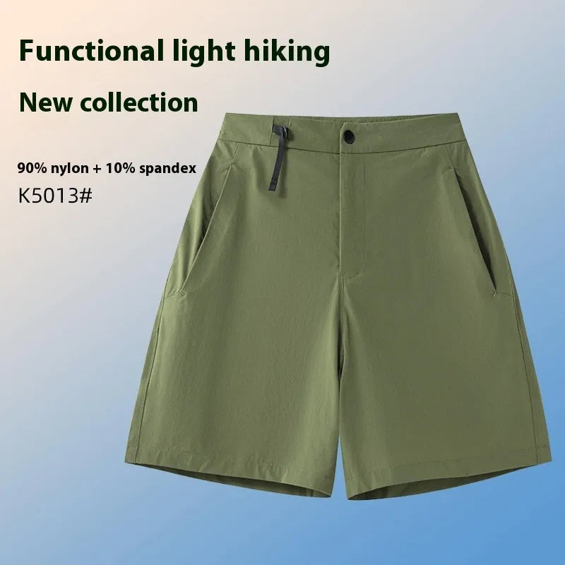 Men's khaki quick-drying sports shorts with 3D cut and elastic waistband laid flat.