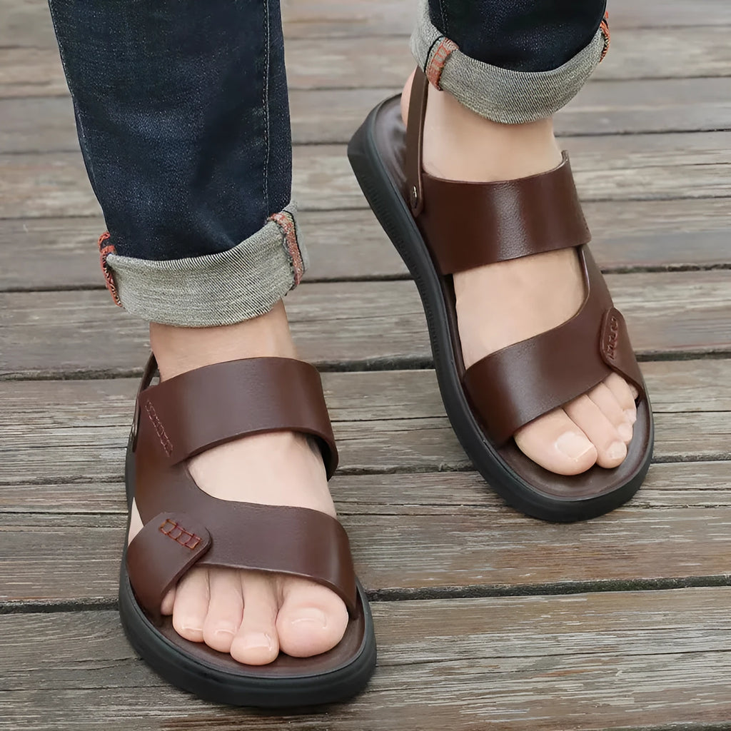 Men's waterproof plastic sandals in black and brown colours, showing casual beach footwear design