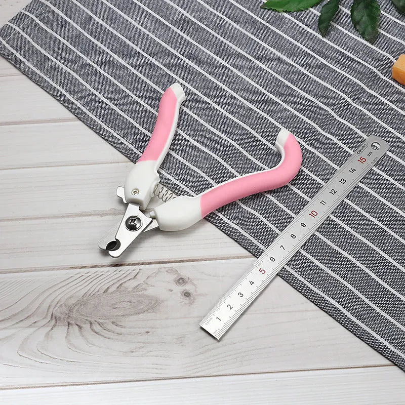 Pet nail scissors with curved handle, stainless steel cutter head, available in blue or pink small or large.