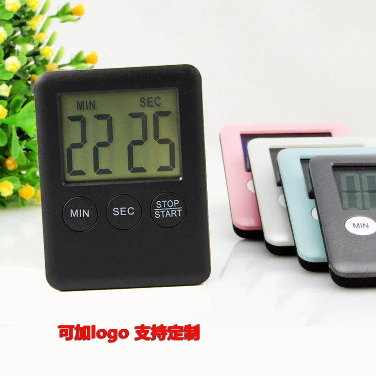 Magnetic kitchen timer with count up and countdown functions in black or white colour options