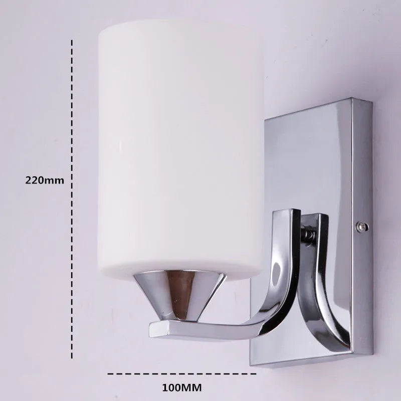 Chrome-finished minimalist glass wall lamp with adjustable dual heads for bedside lighting