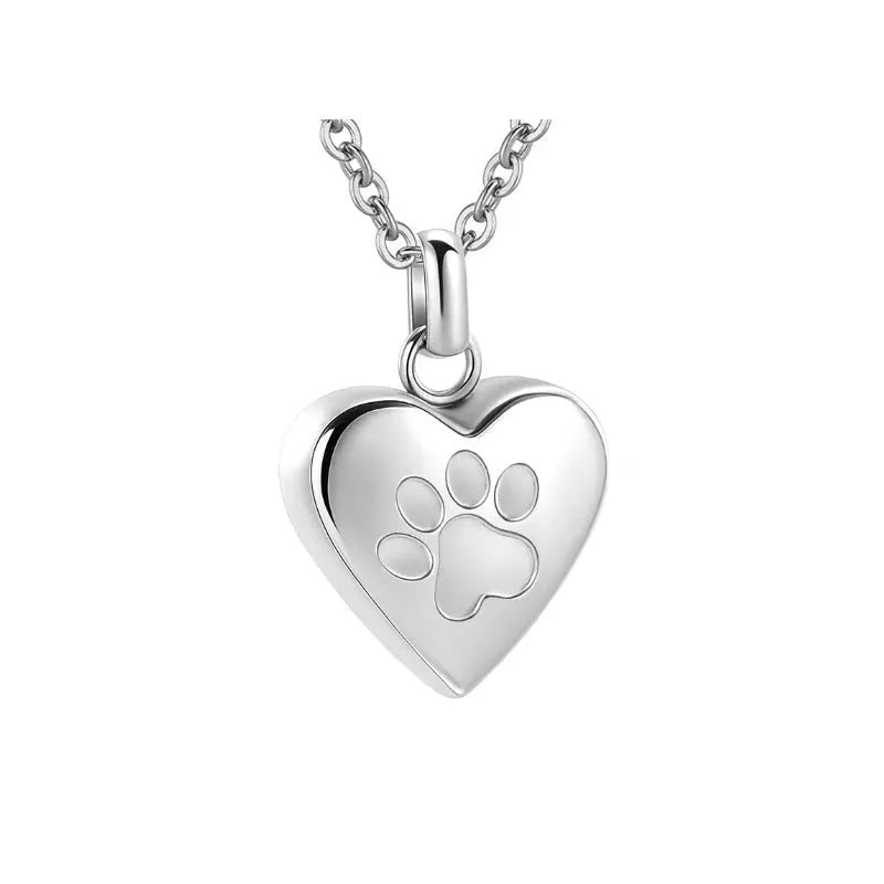 Silver titanium steel heart pendant necklace that opens, used as a cremation casket.