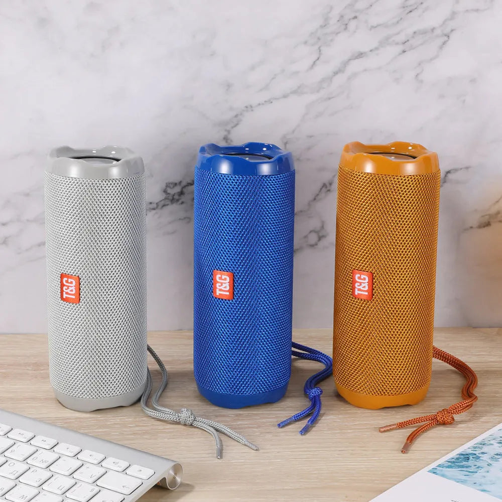 Fabric covered portable Bluetooth speaker with integrated card holder in multiple colour options