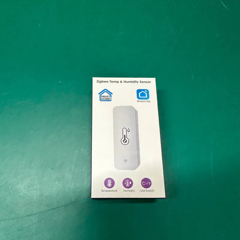 White WiFi temperature humidity sensor with compact rectangular design showing digital display