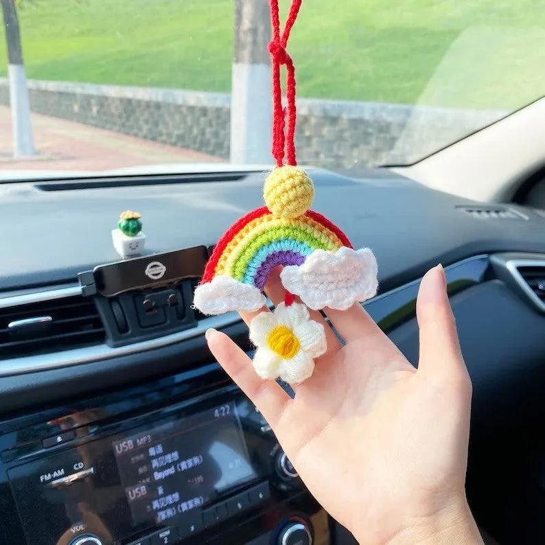 Handmade crocheted wool car pendant with avocado and rainbow design in three colour variations