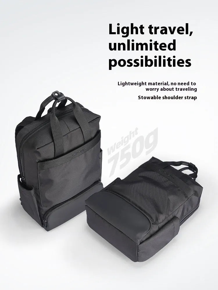 Black lightweight Oxford cloth computer backpack showing internal organisational compartments