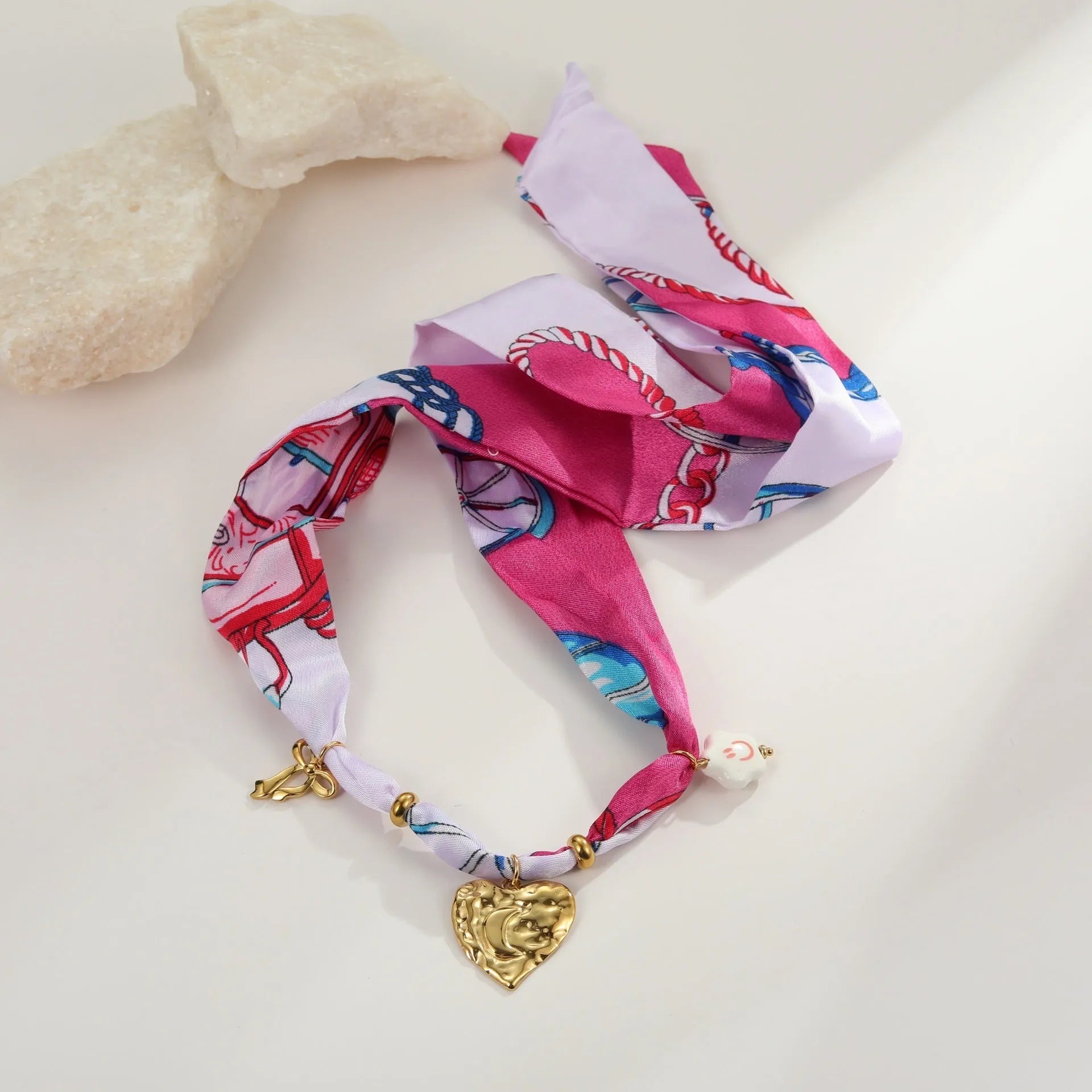 Stainless steel 18K gold-plated necklace and bracelet set with geometric silk scarf pendant